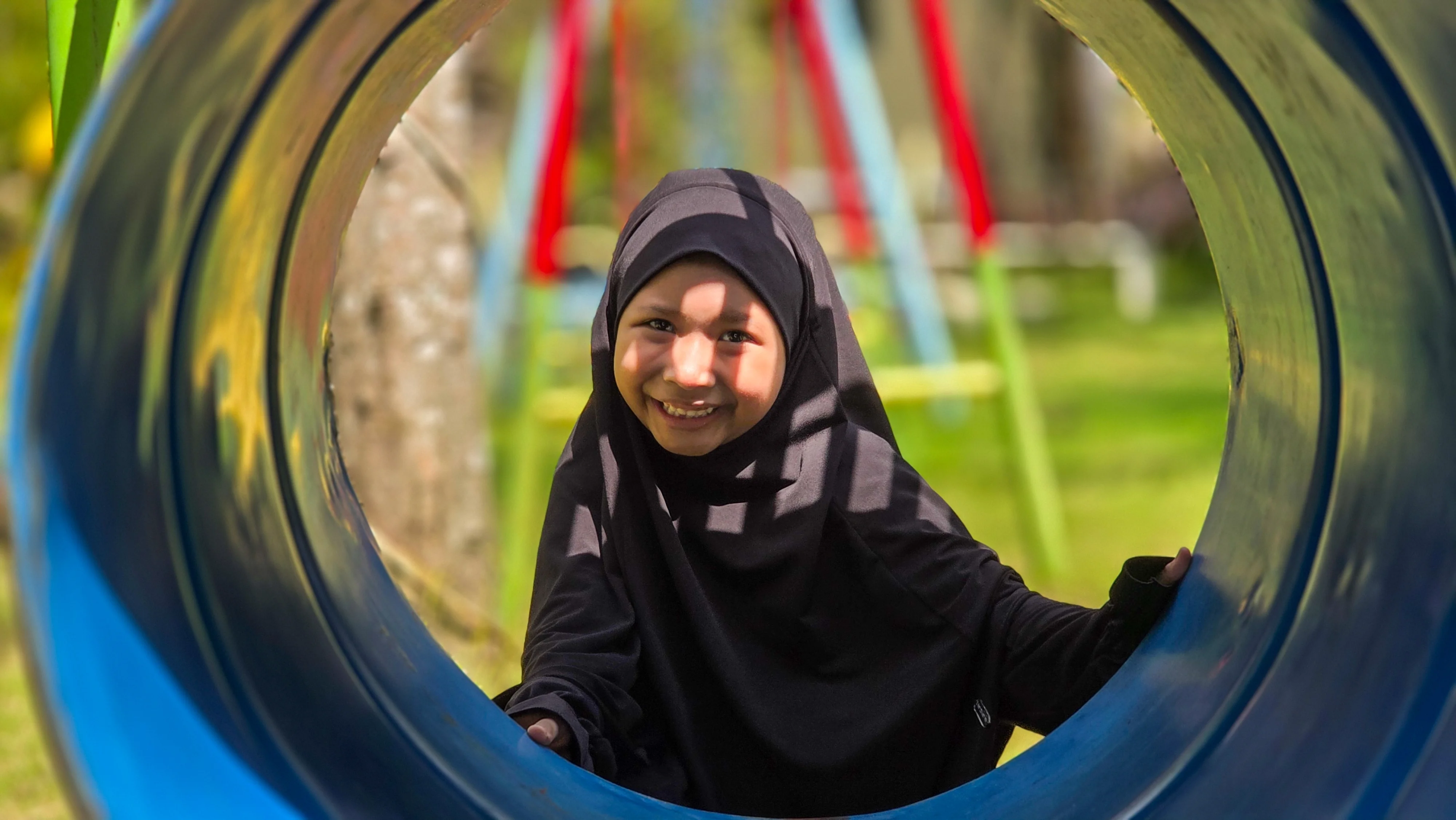 Young girl playing in a park