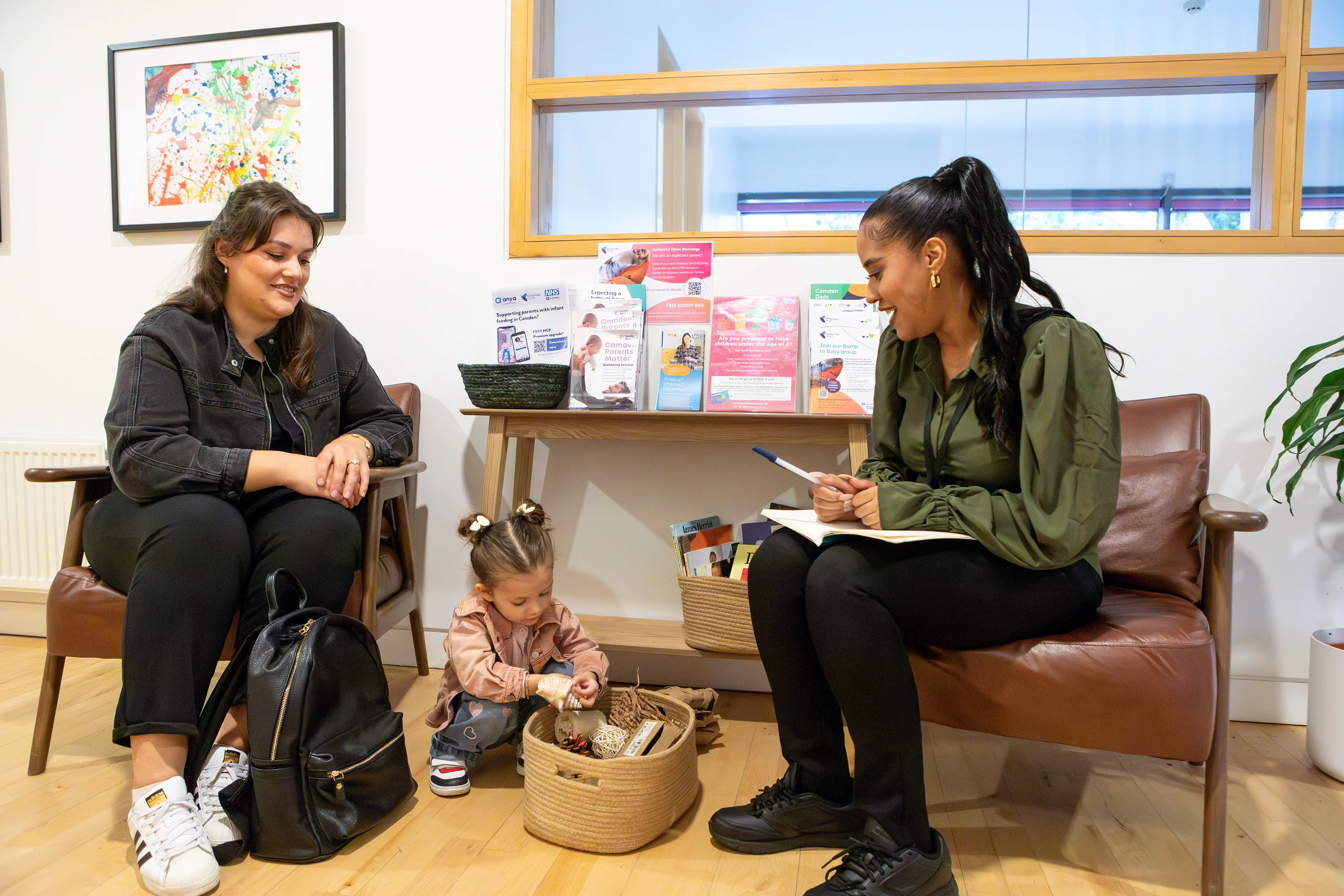 Staff member talking to parent/carer