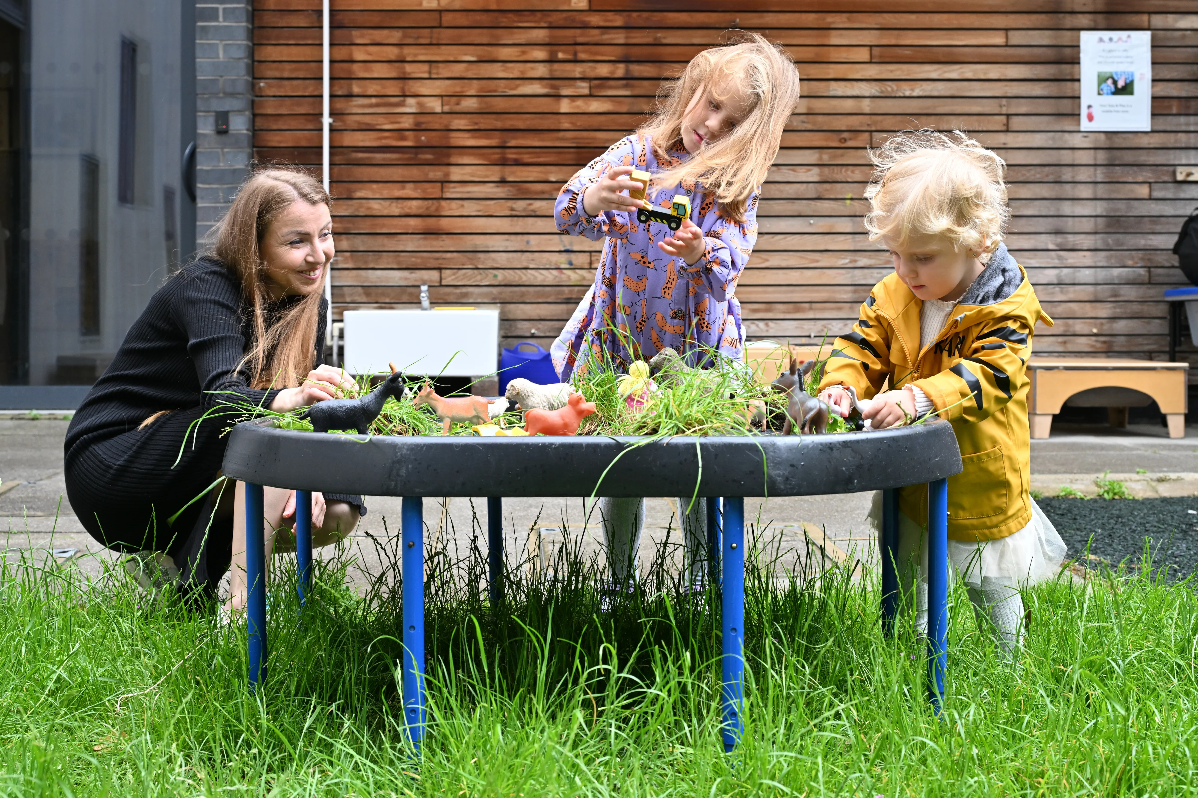 Parent and children playing