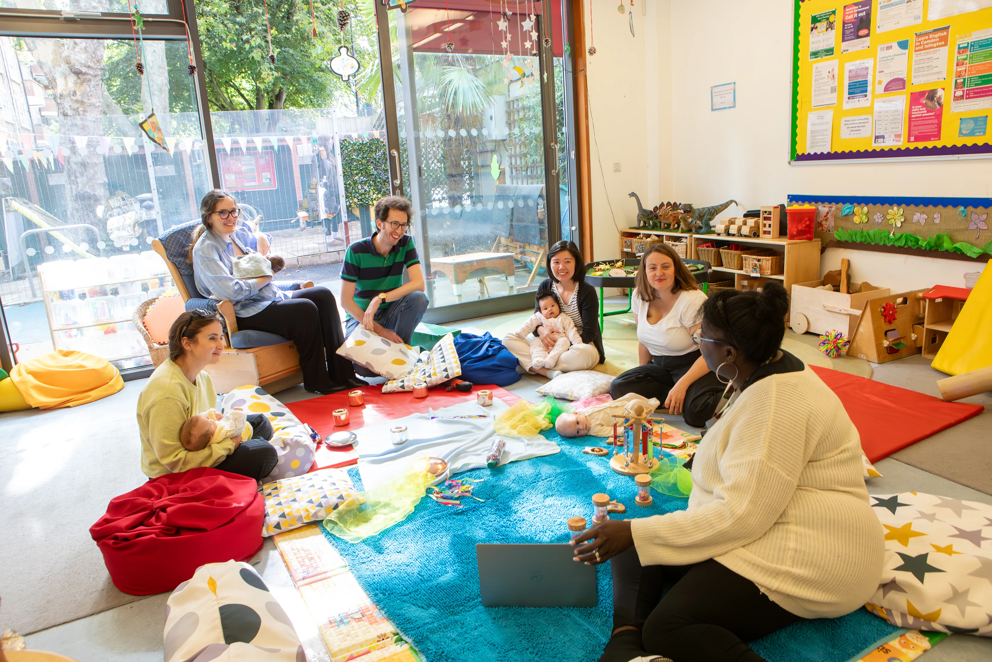 Parents/carers with babies at at stay and play session at Harmood Family Hub